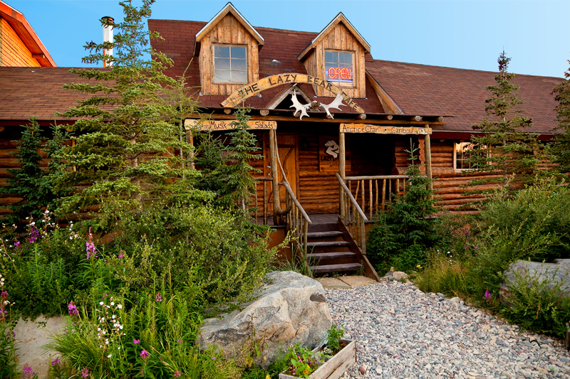 Lazy Bear Lodge, your retreat in Churchill, Manitoba, providing a cozy haven amidst the wild beauty of the Arctic. A central hub for captivating adventures with Polar Bears, Beluga Whales, and the enchanting Northern Lights on your extraordinary journey.