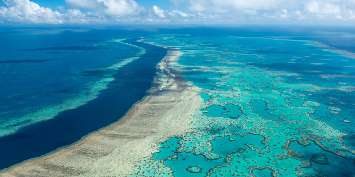 Explore the breathtaking Great Barrier Reef, a highlight of the journey to Australia spanning 21 countries, designed for self-flying pilots with a passion for adventure and exploration.