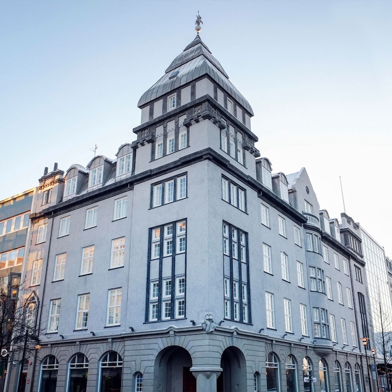 The elegant facade of the Apotek Hotel, in downtown Reykjavik, Iceland, blending classic architectural details with modern charm