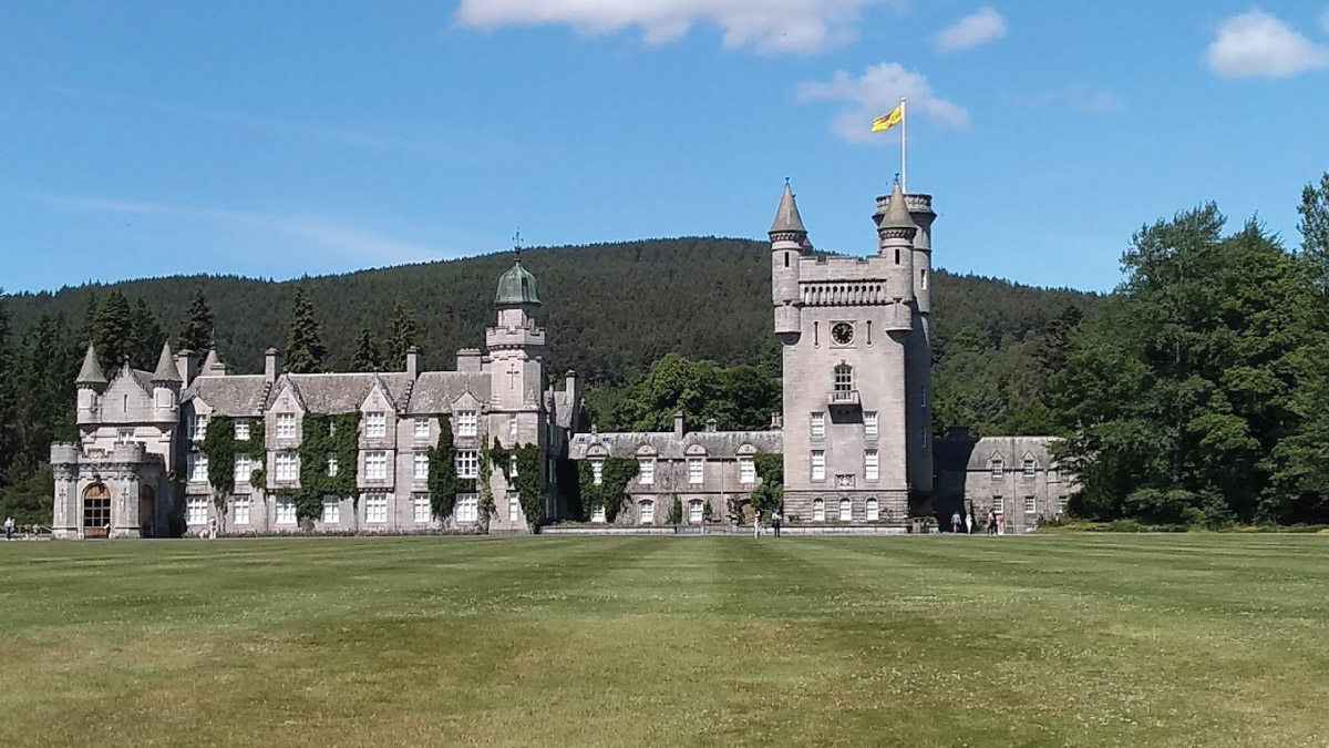 Braemar Castle in Braemar, Scotland, inviting self-flying pilots with their own aircraft to immerse themselves in Europe's rich heritage and rugged beauty, as they explore historic landmarks nestled amidst the breathtaking Scottish landscape.