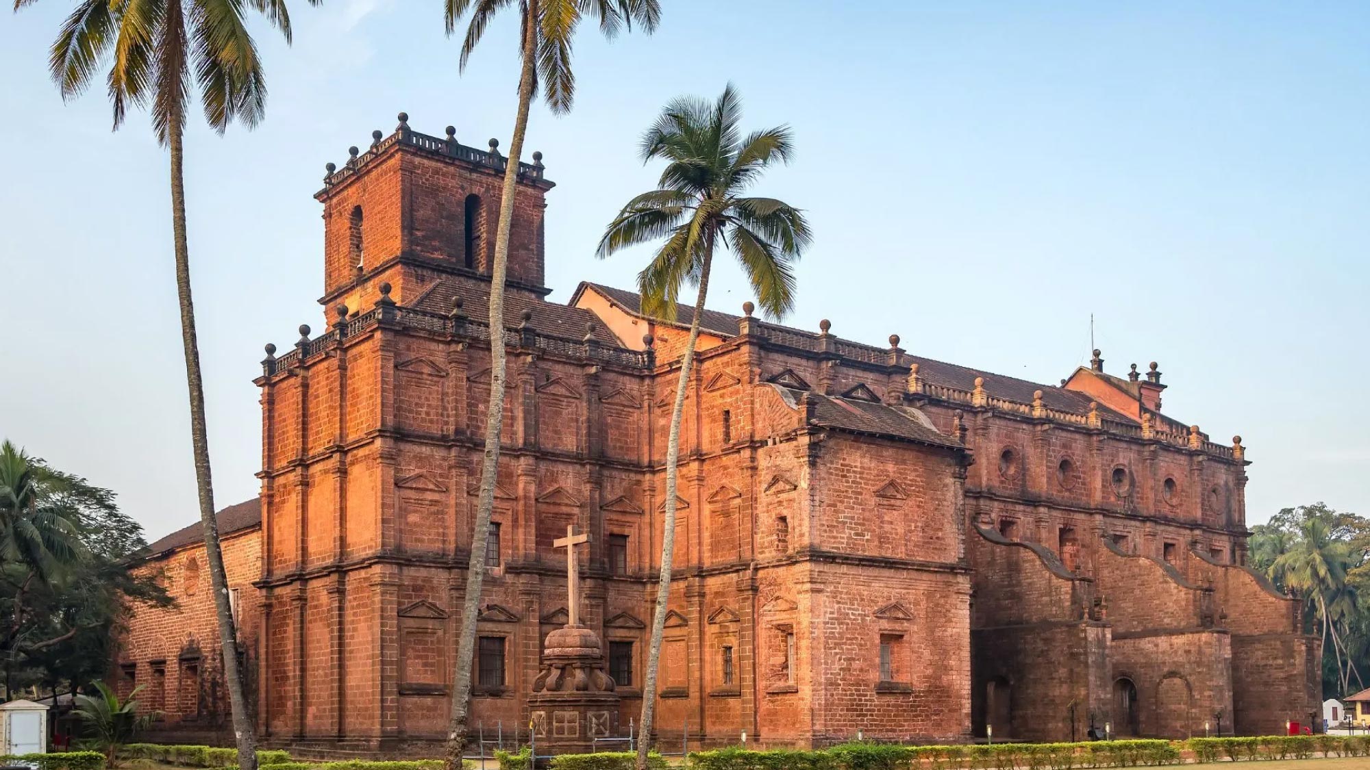 A vibrant image capturing the scenic beauty of Goa, India, featuring palm-fringed beaches, turquoise waters, and colorful architecture. This destination is a highlight of a journey to Australia, visiting 21 countries, ideal for travelers who fly and own their own airplanes.