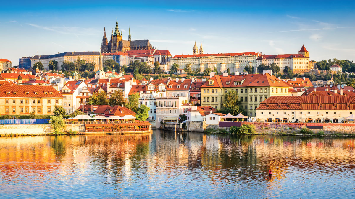 Panoramic view of Prague, Czech Republic, inviting self-flying pilots with their own aircraft to explore the heart of Europe's rich history, stunning architecture, and vibrant culture from above.