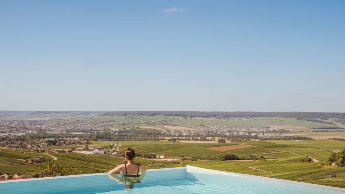 This photo showcases the stunning beauty of Champagne's wine region, inviting aviators to relax and rejuvenate in the exquisite surroundings before continuing their aerial journey through Europe from the cockpit of their own airplanes