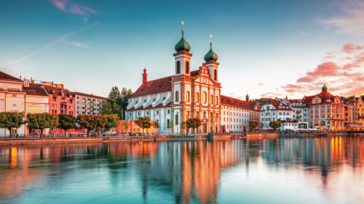 A captivating view of Lucerne, Switzerland, nestled amidst the Swiss Alps and the tranquil waters of Lake Lucerne. Tailored for self-flying pilots planning a European adventure