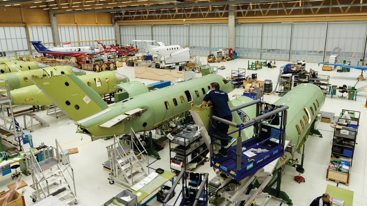This photo offers a glimpse into the world-renowned Pilatus brand, known for its quality aircraft manufacturing, and invites aviators to explore the birthplace of legendary aircraft from the skies.