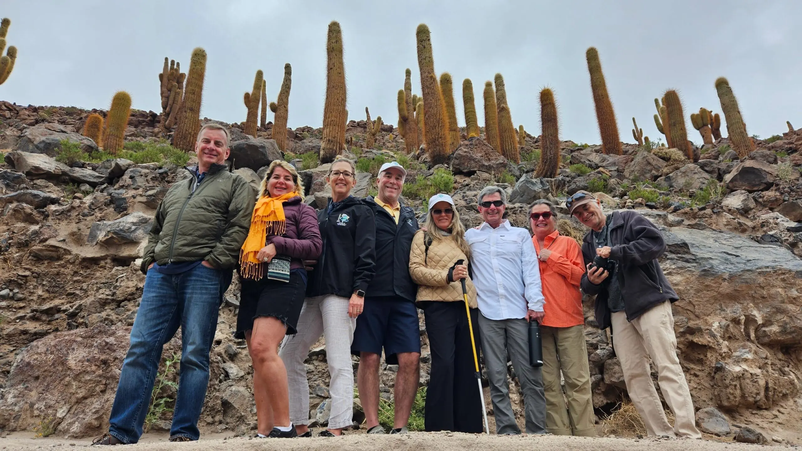 A group of travelers is trekking through the Atacama Desert in Chile.